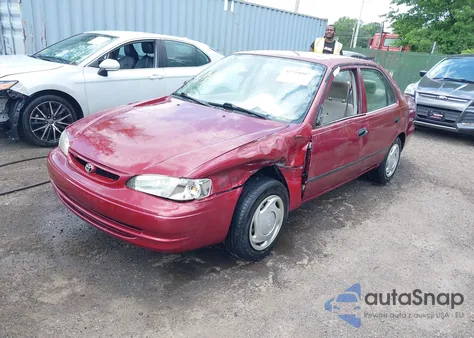 1999 Toyota Corolla Ce from USA, damaged, VIN 2T1BR12E4XC228371